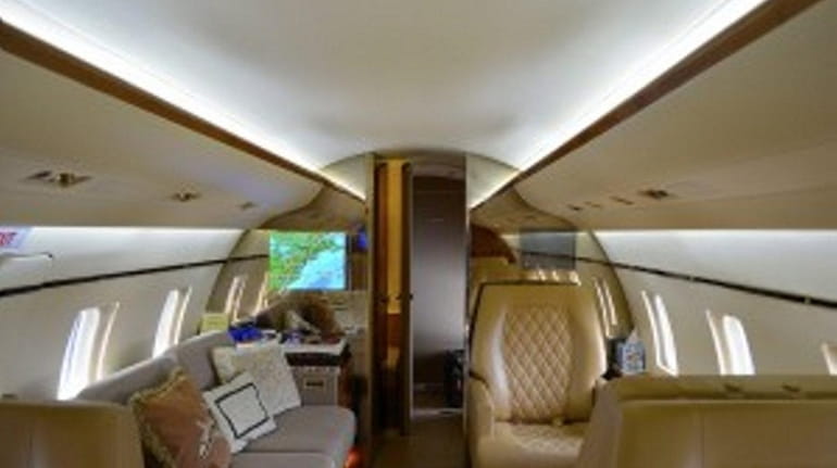 Interior of private/corporate jet that are illuminated with LED lights...