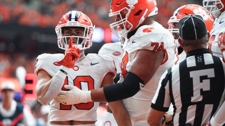 Clemson wide receiver Troy Stellato, left, celebrates with offensive lineman...