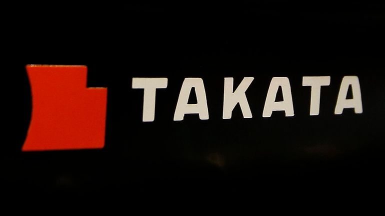 The logo of Takata Corp. is displayed at an auto...