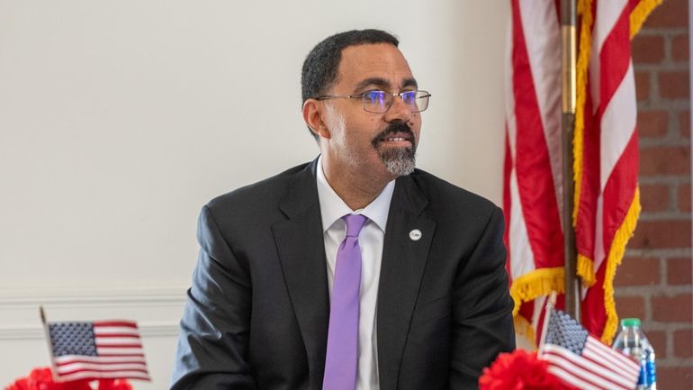 SUNY chancellor John King speaking at Farmingdale State College on...