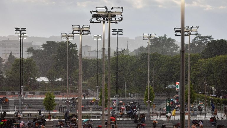 Rain interrupted matches of the French Open tennis tournament at...