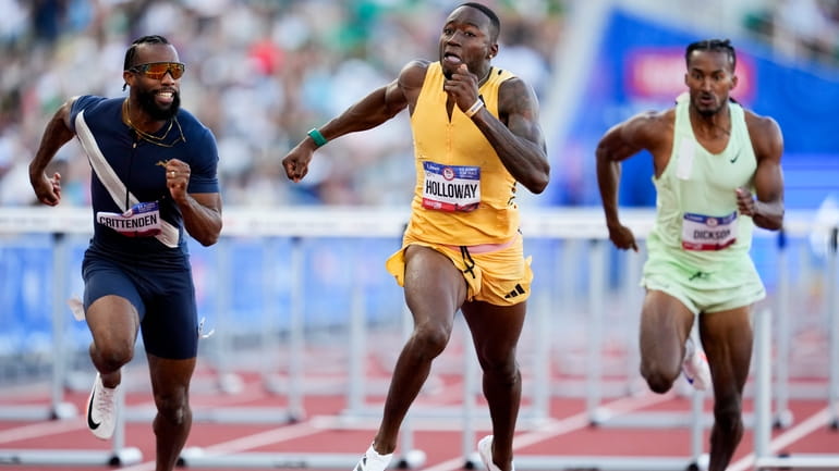 Grant Holloway wins the men's 110-meter hurdles final during the...