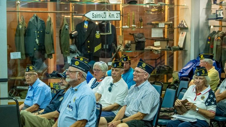 Veterans listen Thursday at the meeting concerning American Legion post...