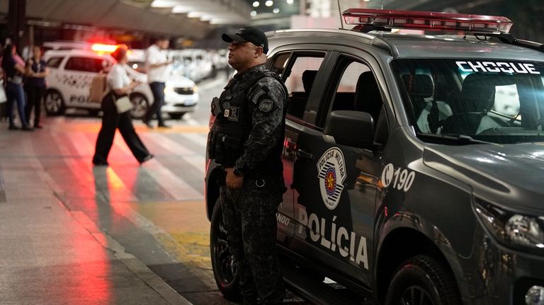 A policeman stands guard during the arrival of the Green...