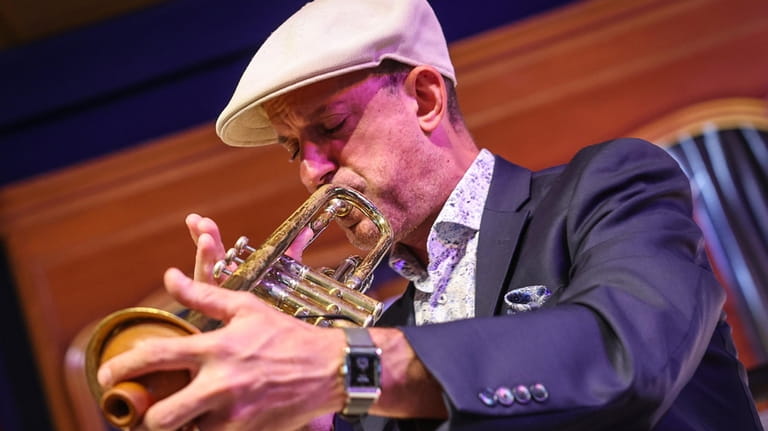 Tom Manuel, president and founder of the Jazz Loft, performs...