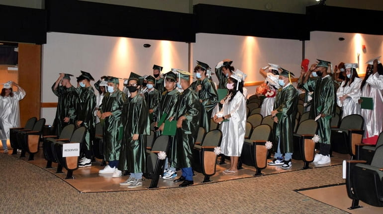 In Mastic Beach, 39 seniors turned their tassels to the...