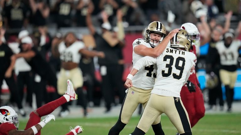 New Orleans Saints place kicker Charlie Smyth celebrates his game...