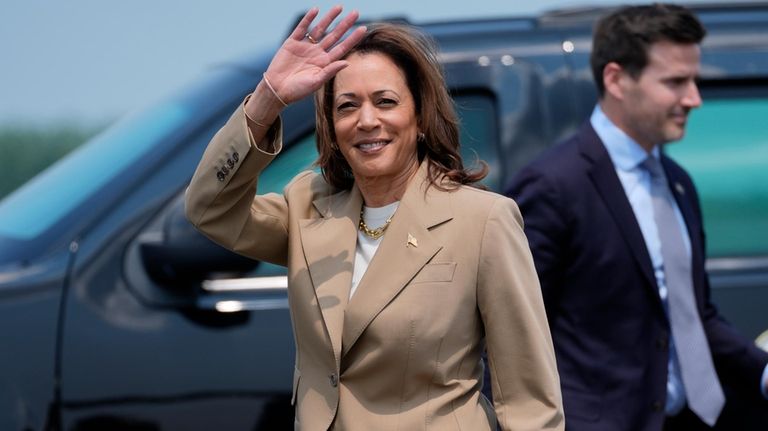 Vice President Kamala Harris waves as she arrives at Westfield-Barnes...