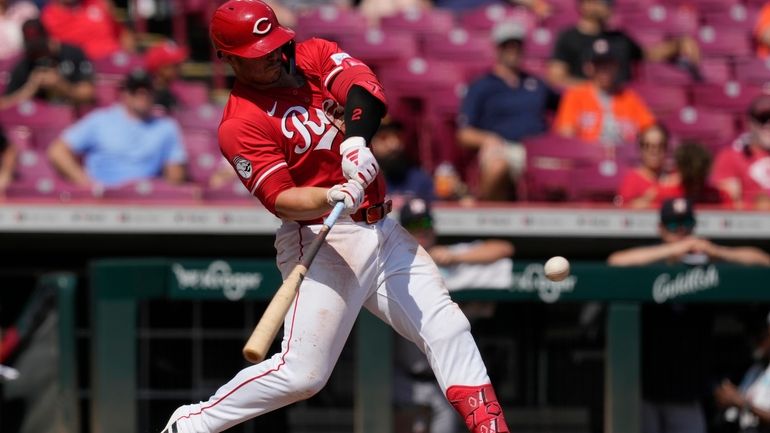 Cincinnati Reds' Ty France hits a home run during the...