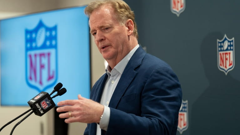NFL Commissioner Roger Goodell responds to questions during a news...