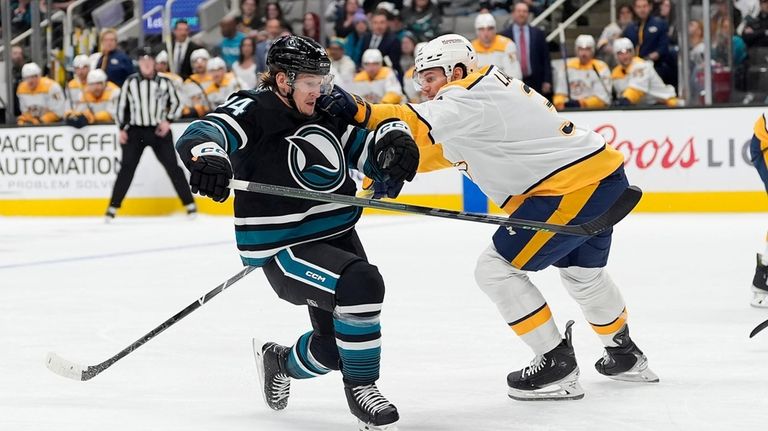 San Jose Sharks left wing Alexander Barabanov (94) moves the...