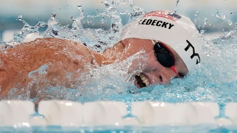 Katie Ledecky, of the United States, competes in the women's...