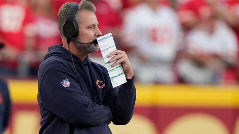 Chicago Bears head coach Matt Eberflus watches from the sidelines...