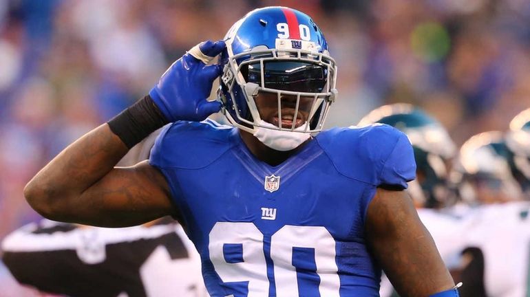 Jason Pierre-Paul of the New York Giants reacts during the...