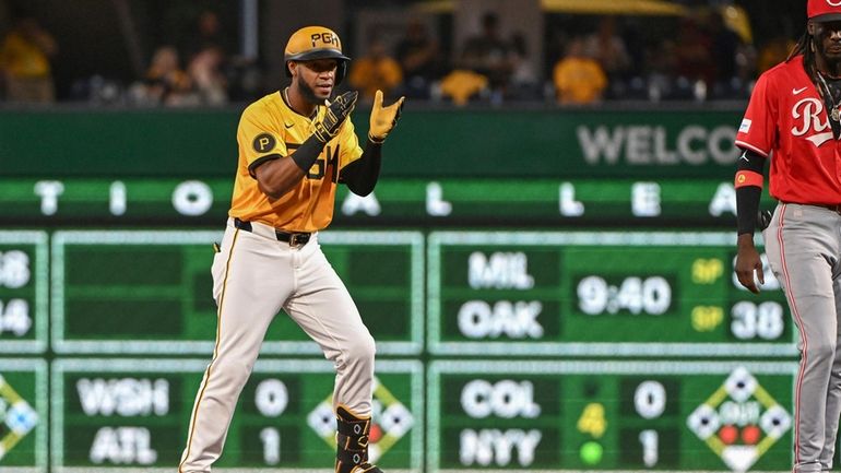 Pittsburgh Pirates outfielder Bryan De La Cruz celebrates after driving...