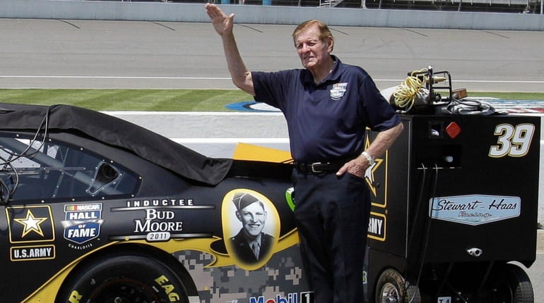 NASCAR Hall of Famer Bud Moore stands next to Ryan...