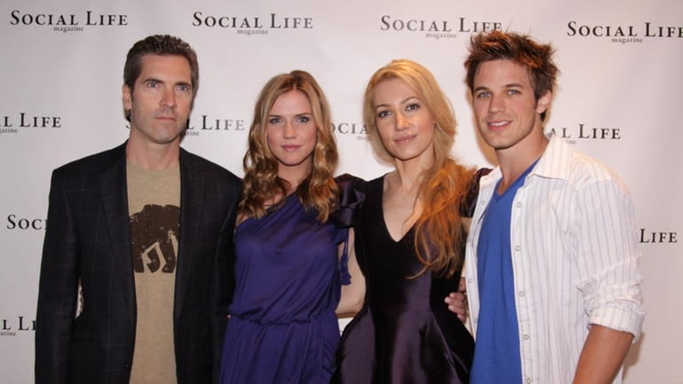 Social Life Magazine's publisher and president Justin Mitchell, left, Sara...