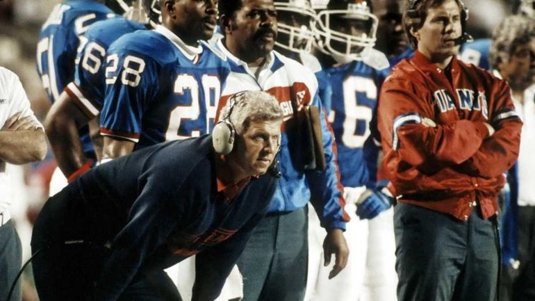 Head coach Bill Parcells of the New York Giants watches...