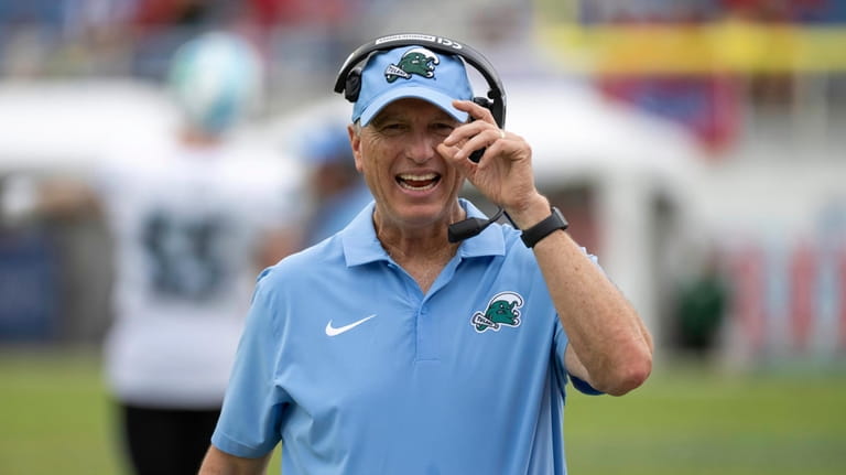 Tulane head coach Willie Fritz reacts on the sidelines during...
