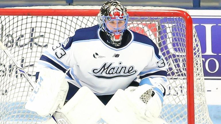 Stephen Mundinger in goal for the University of Maine.