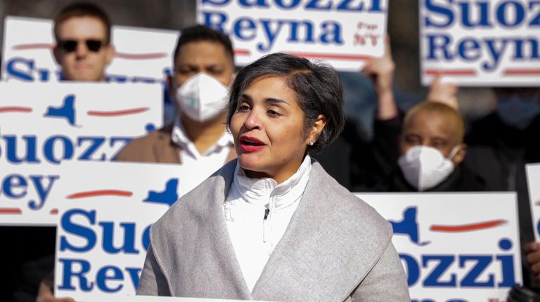 Diana Reyna speaks to the press after Rep. Tom Suozzi,...