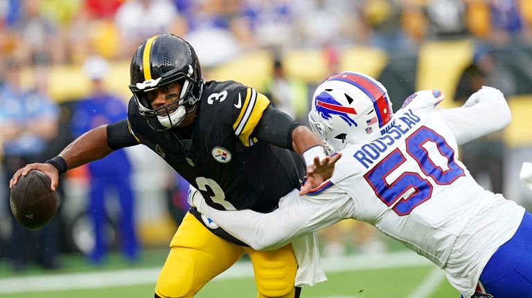 Pittsburgh Steelers quarterback Russell Wilson (3) is sacked by Buffalo...