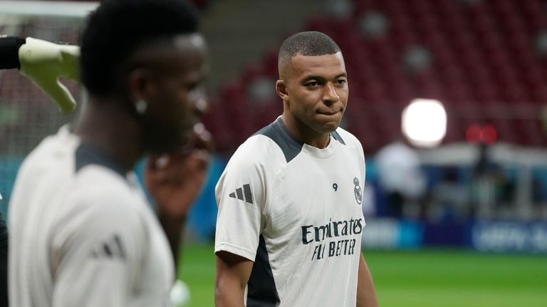 Real Madrid's Kylian Mbappe attends a training session ahead of...