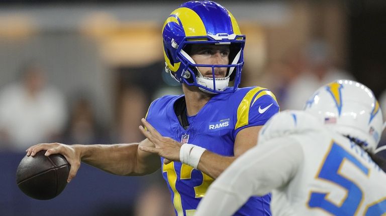 Los Angeles Rams quarterback Brett Rypien throws against the Los Angeles  Chargers during the first half of a preseason NFL football game Saturday,  Aug. 12, 2023, in Inglewood, Calif. (AP Photo/Ryan Sun