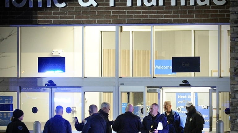 Police respond to the scene of a shooting on Monday,...