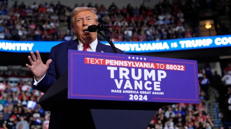 Republican presidential nominee former President Donald Trump speaks at a...