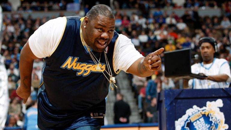 Biz Markie performs for fans during halftime of the Denver...