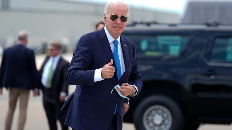 President Joe Biden arrives to board Air Force One at...