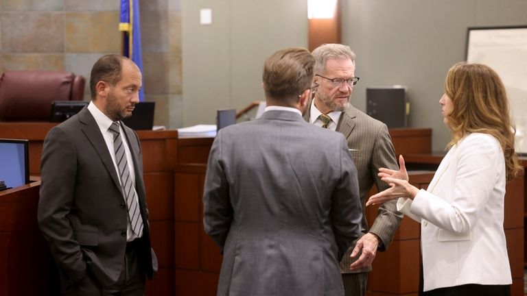 From left; Chief Deputy District Attorney Christopher Hamner, defense attorney...