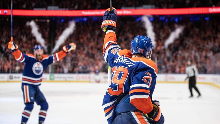 Edmonton Oilers' Leon Draisaitl (29) celebrates a goal against the...