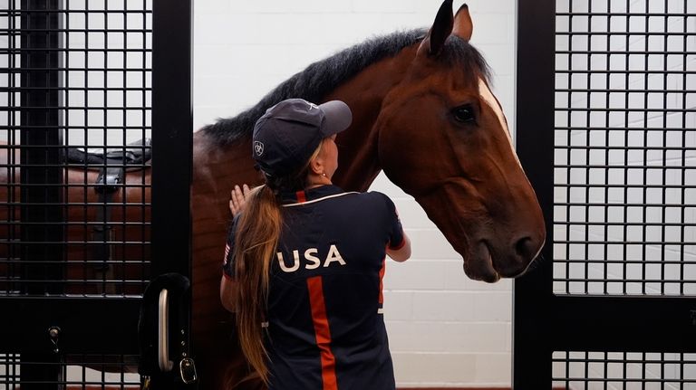 Hailey Burlock, groom for U.S. Olympic Eventing Team member Will...