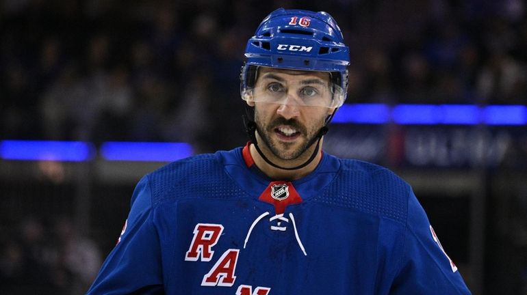 Rangers center Vincent Trocheck looks on before a faceoff against Sharks...