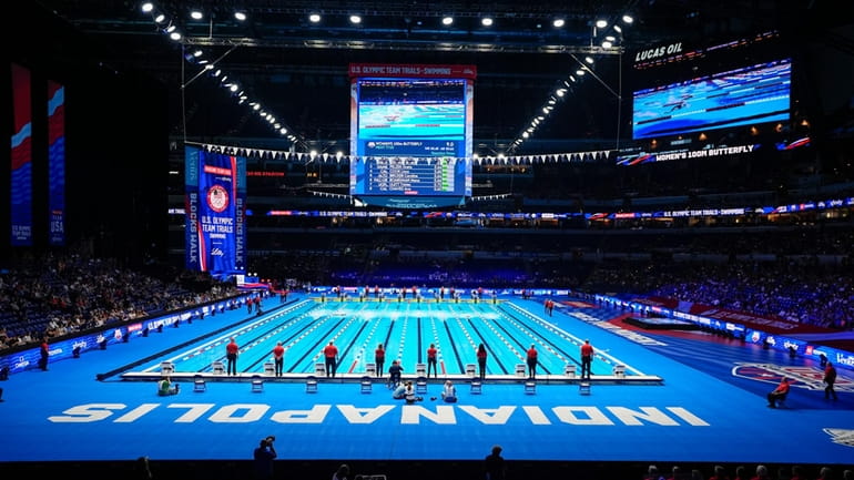 Swimmer participate in the Women's 100 Butterfly Saturday, June 15,...