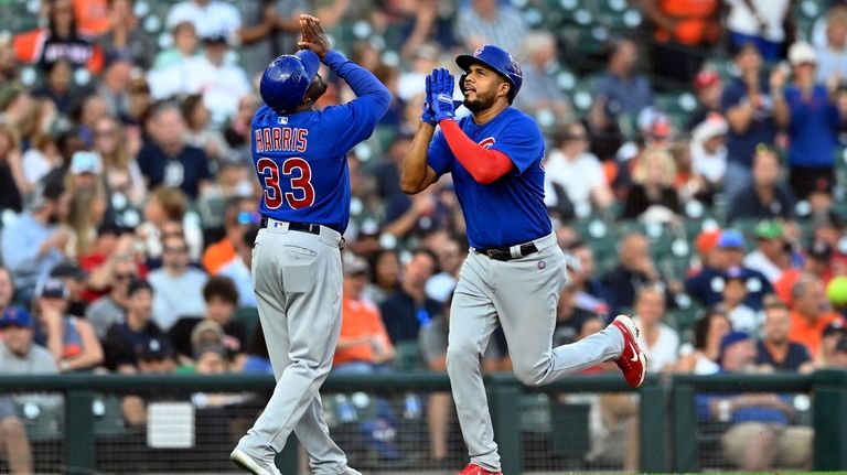 Chicago Cubs' Zach McKinstry runs the bases after hitting a two