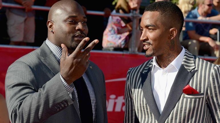 TV personality Marcellus Wiley and Knicks player J.R. Smith arrives...