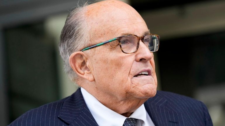 Rudy Giuliani speaks with reporters on May 19 in Washington.