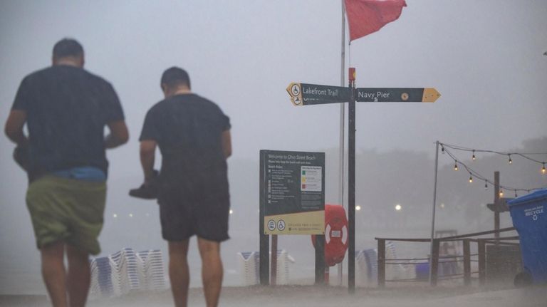 A seiche creates dangerous swimming conditions through the evening in...