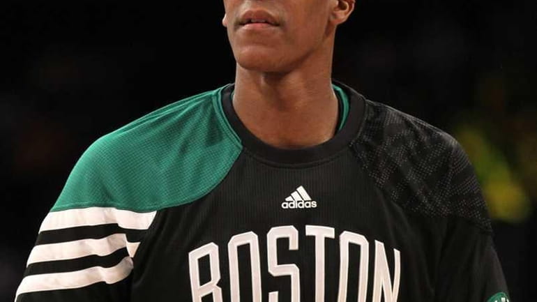 Rajon Rondo #5 of the Boston Celtics wears a pair...