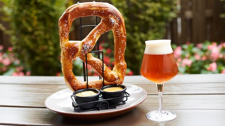 The Garden Social Ale and a pretzel with mustard and...