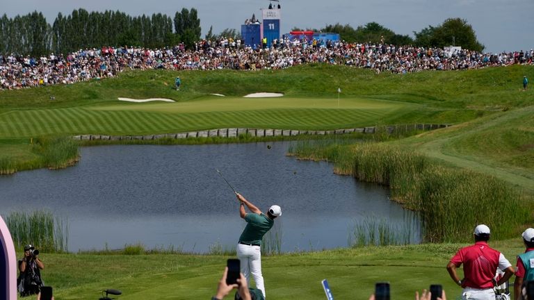 Rory McIlroy, of Ireland, plays off the 11 tee during...