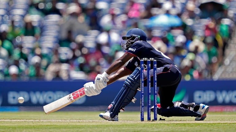 United States' Aaron Jones plays a shot during the ICC...