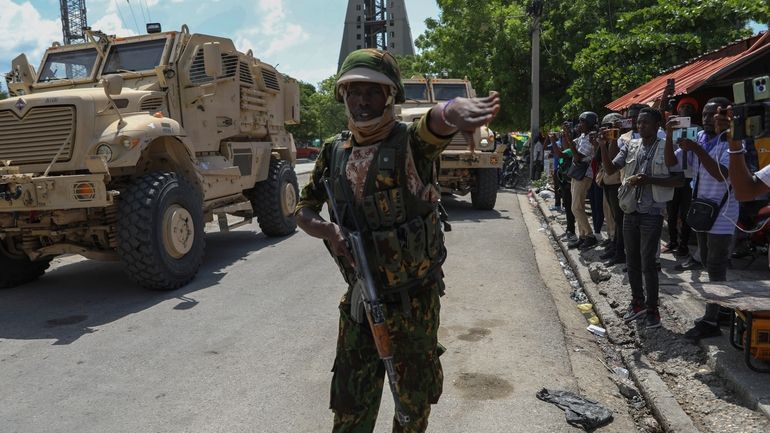 A Kenyan police officer part of a UN-backed multinational force...