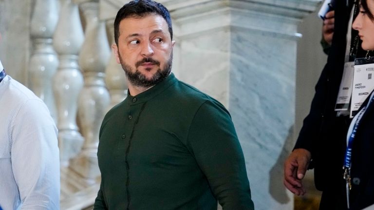 Ukraine's President Volodymyr Zelenskyy leaves after meeting Italian Premier Giorgia...