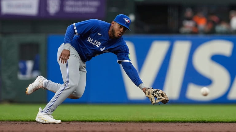 Toronto Blue Jays second baseman Leo Jiménez is unable to...