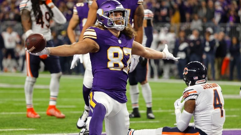 Minnesota Vikings tight end T.J. Hockenson (87) celebrates in front...