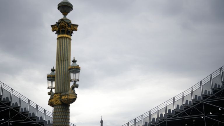 The Eiffel Tower, background, is seen from La Concorde olympic...